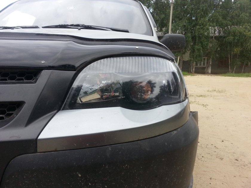 Чёрные фары Нива Шевроле