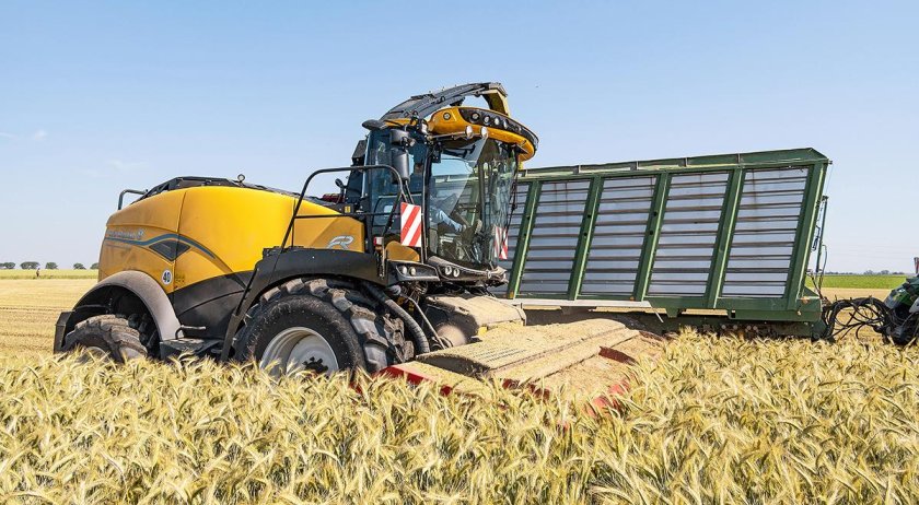 Комбайн нью холланд