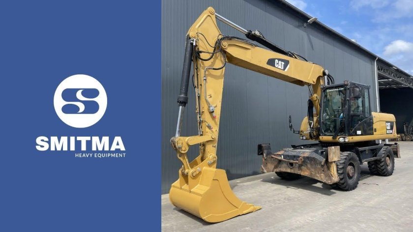 Колесный экскаватор