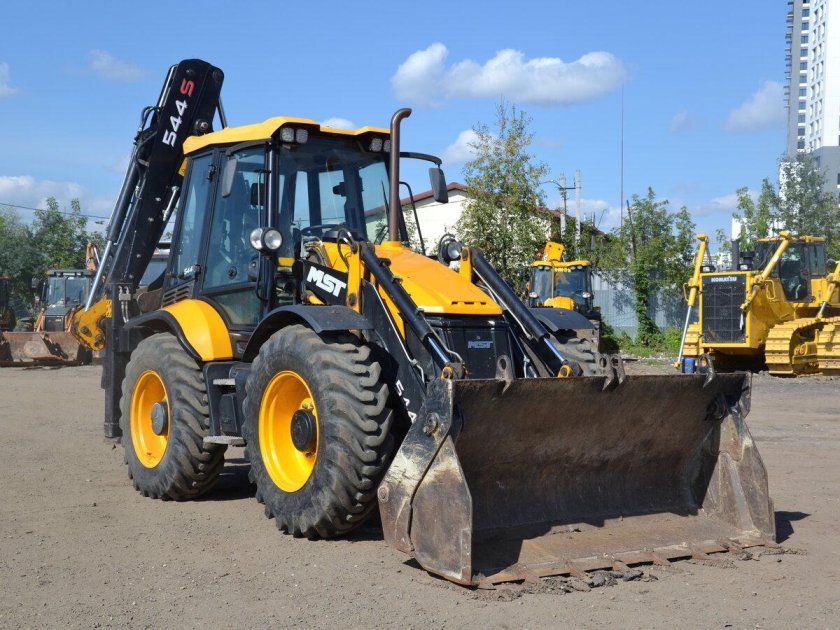 MST 544 экскаватор погрузчик