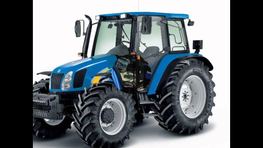 Нью Холланд 100