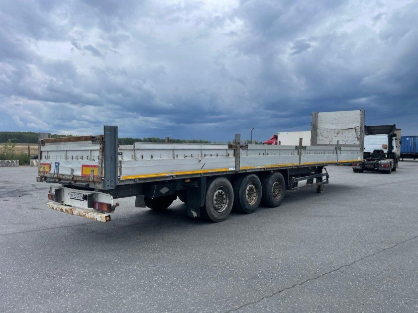 Полуприцеп бортовой Schmitz