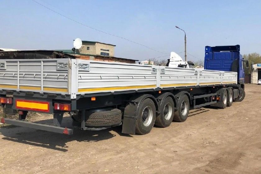 Полуприцеп бортовой МАЗ 975800