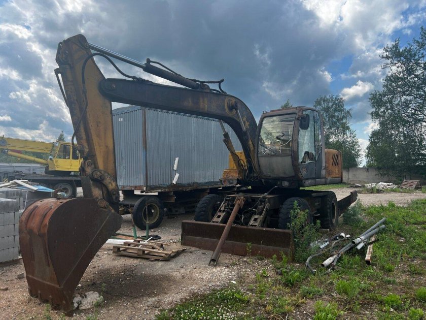 Экскаватор колесный ек-12