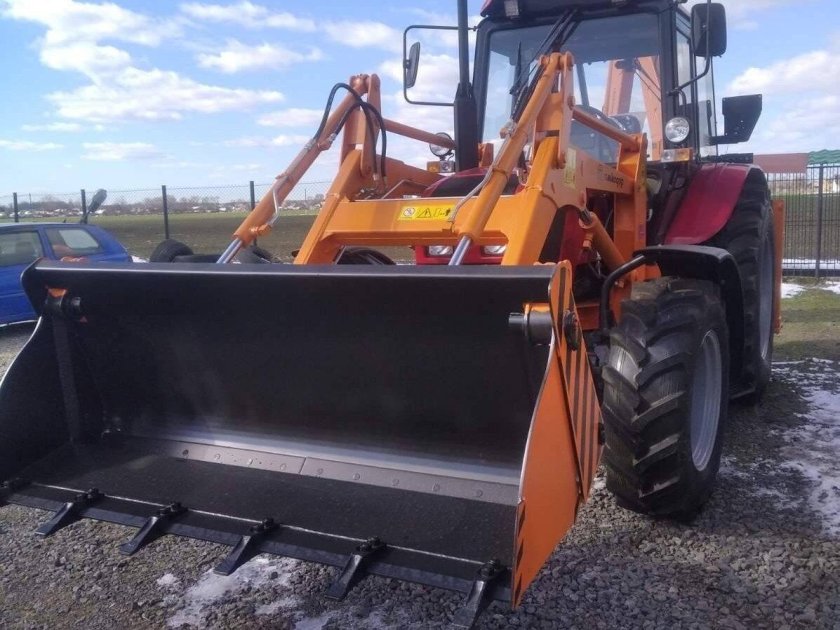 Экскаватор-погрузчик амкодор 702еа