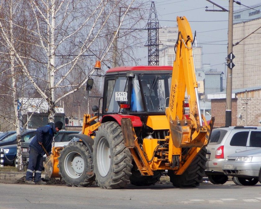 Экскаватор-погрузчик Амкодор 702еа