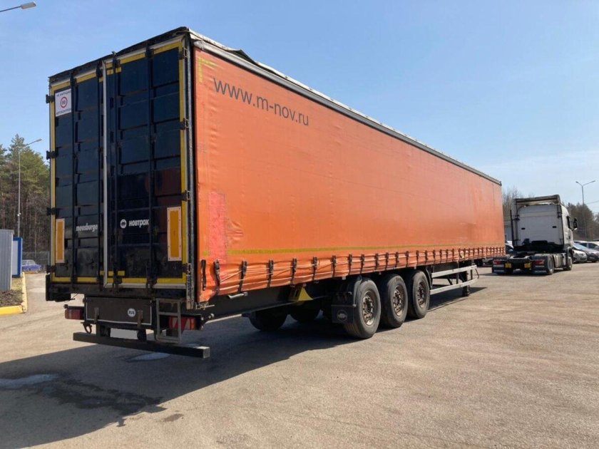 Шторно бортовой полуприцеп meusburger