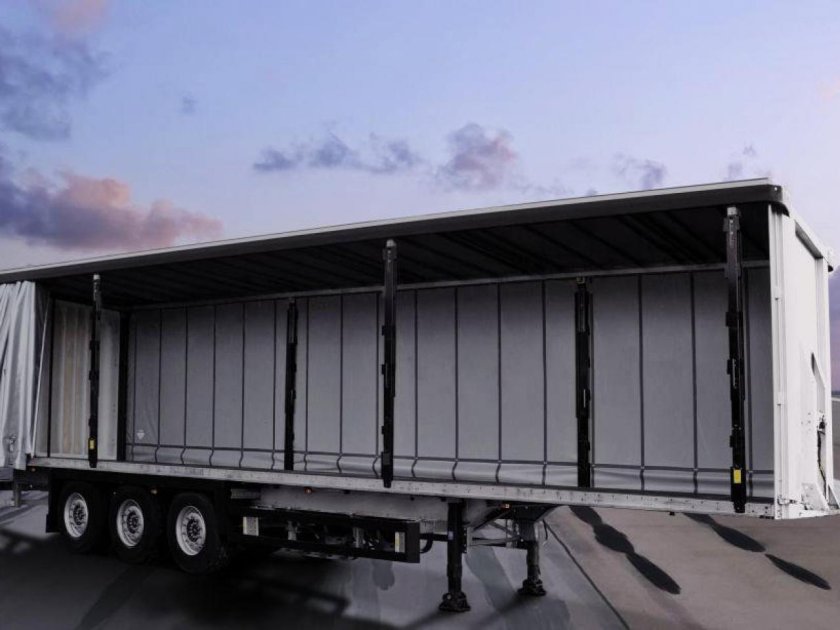 Шмитц полуприцеп тентованный