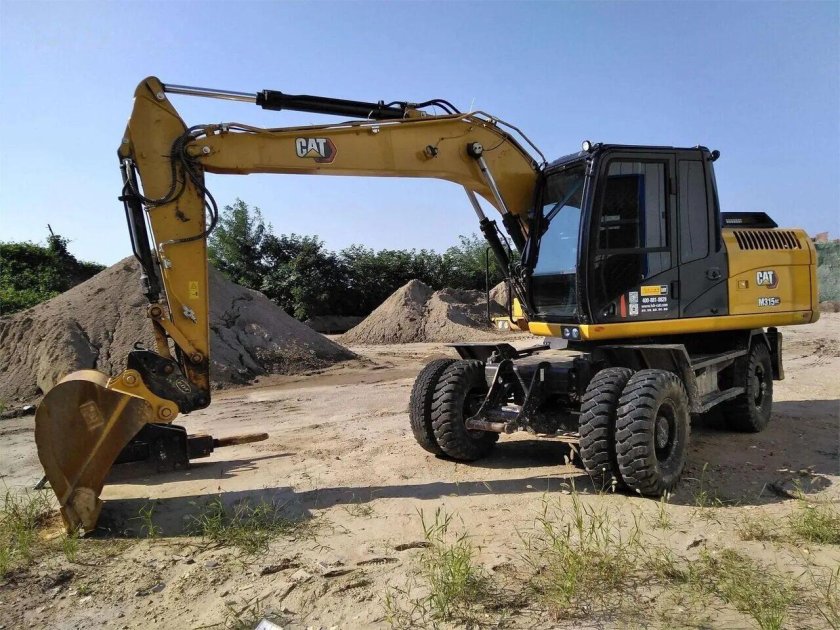 Экскаватор колесный полноповоротный