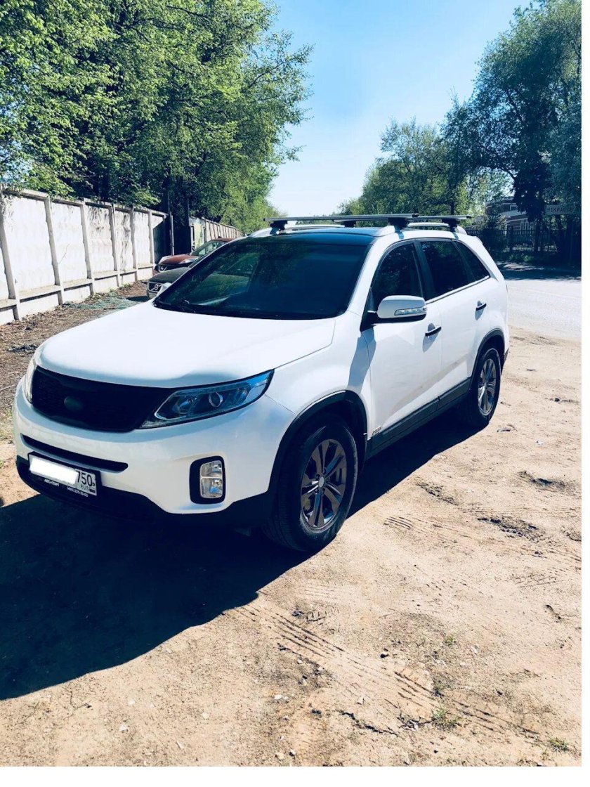 Киа Соренто 2014 белая