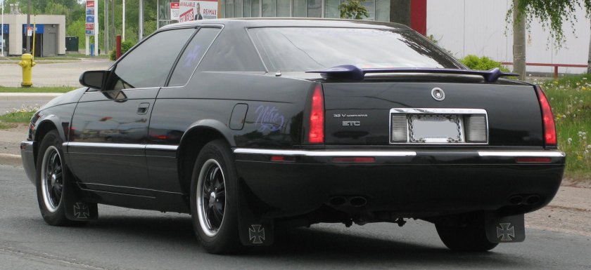 Кадиллак Touring Coupe