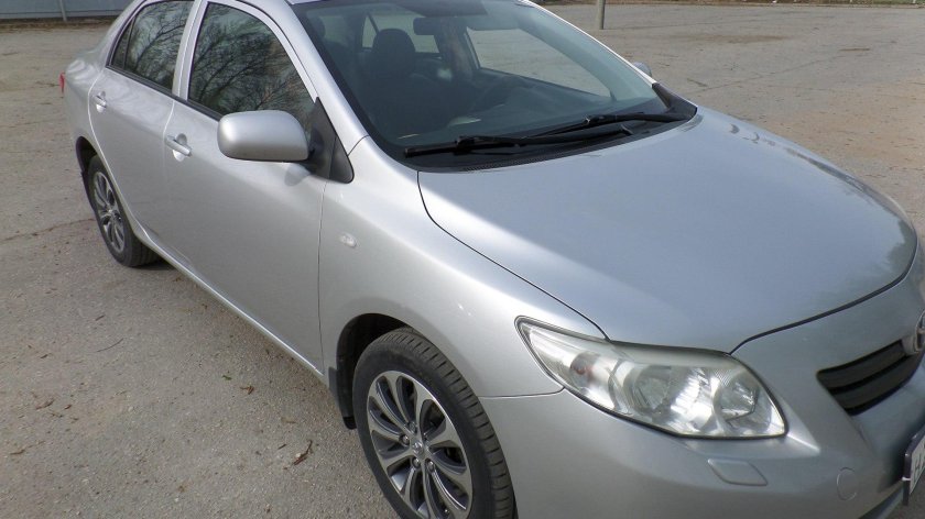 Тойота Королла 2008 серебристая