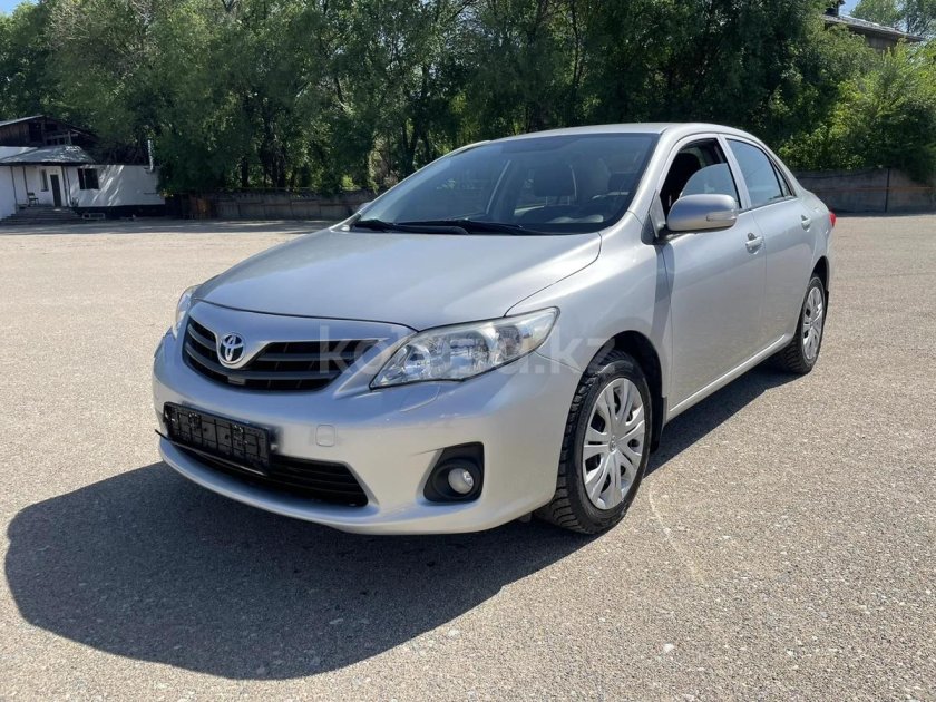 Тойота Королла 2007 серебристая