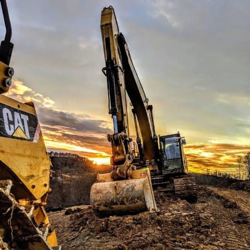 Катерпиллер экскаватор