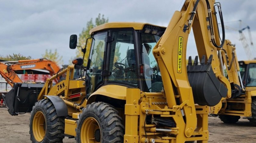 Экскаватор погрузчик равноколесный