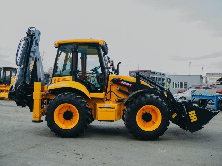 Равноколесный экскаватор погрузчик