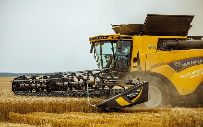 Комбайн Нью Холланд