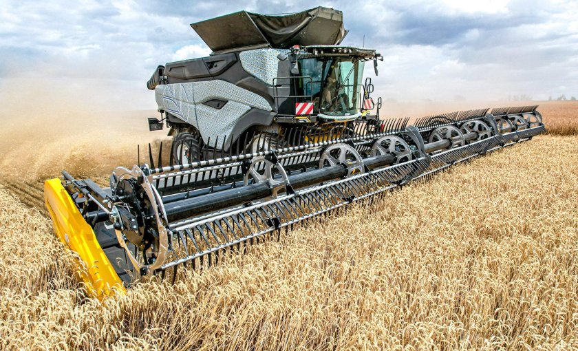 Комбайн Нью Холланд