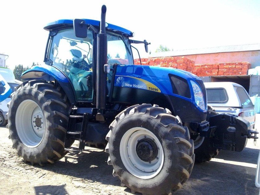 Трактор Нью Холланд т9040