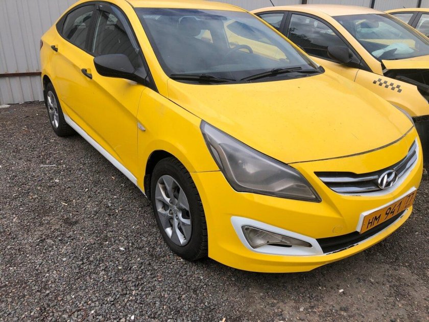 Хендай Солярис желтый