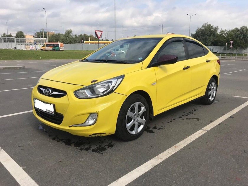 Хендай Солярис желтый