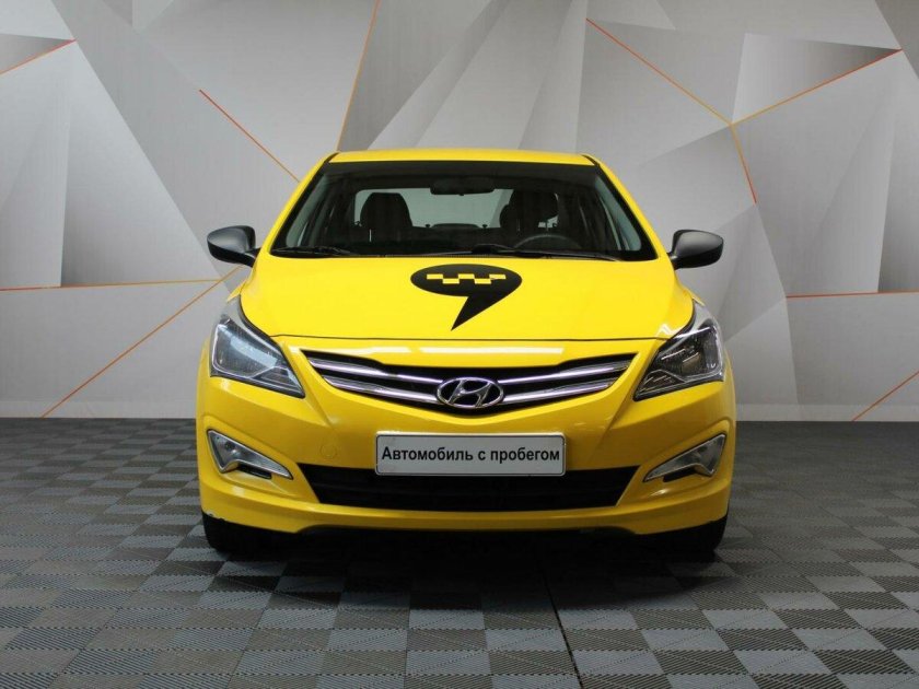 Хендай Солярис желтый