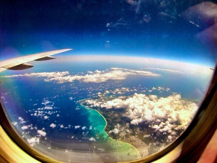 Виз из илюминатора самолета