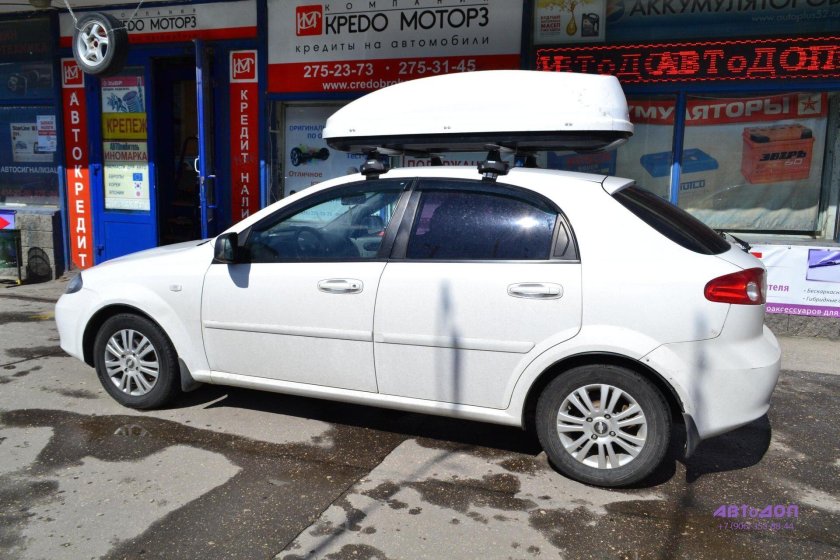 Багажник Thule Chevrolet Lacetti 2010