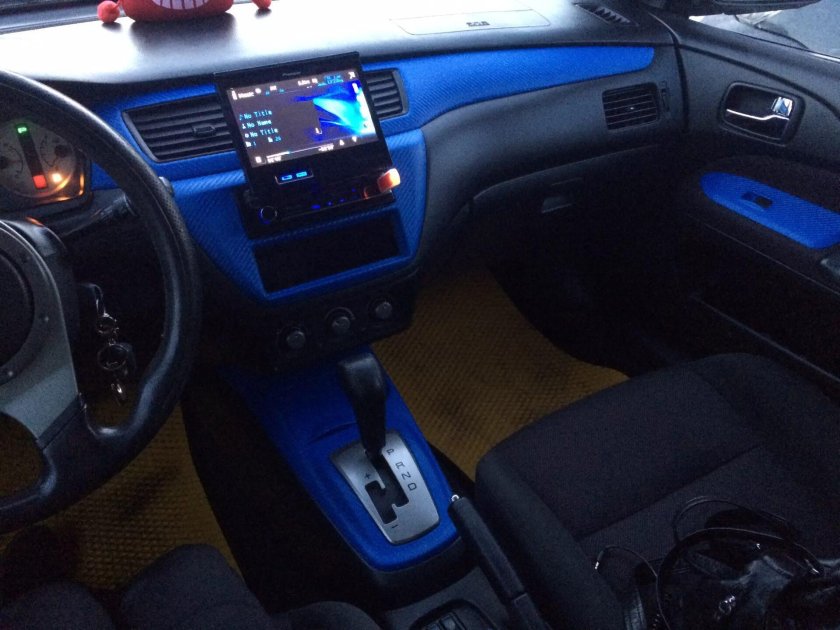 Лансер 9 синий салон