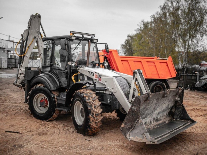 Экскаватор погрузчик терекс 825