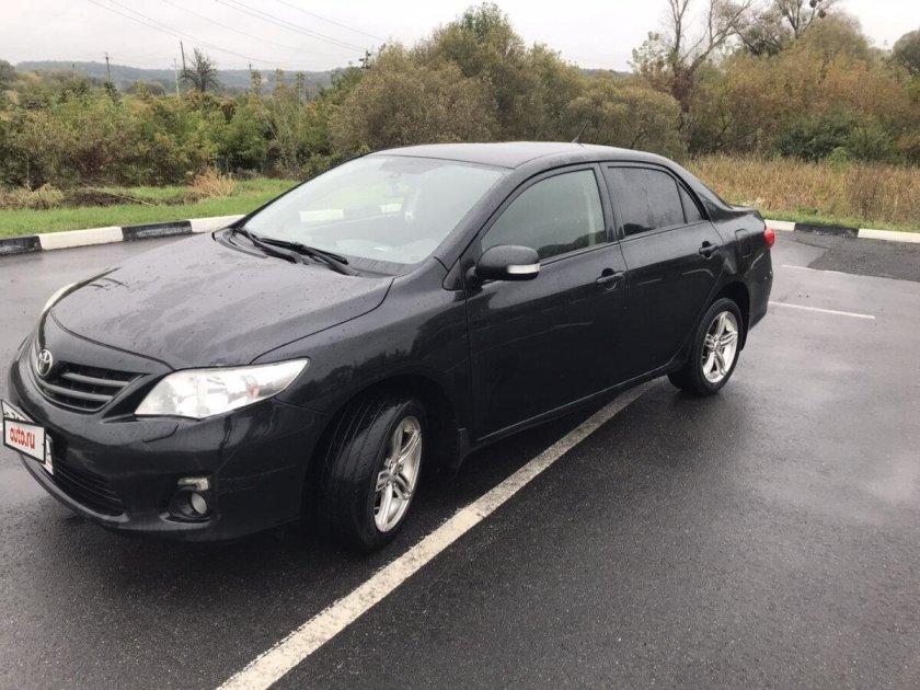 Тойота Королла е140 черная