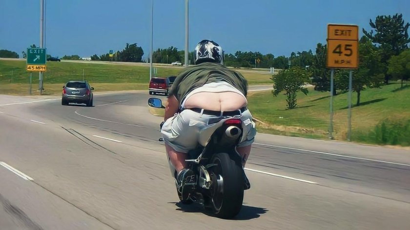 Смешной мотоциклист