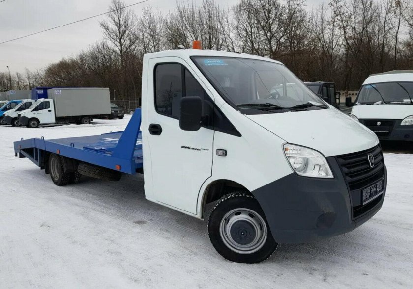 Эвакуатор Некст белый