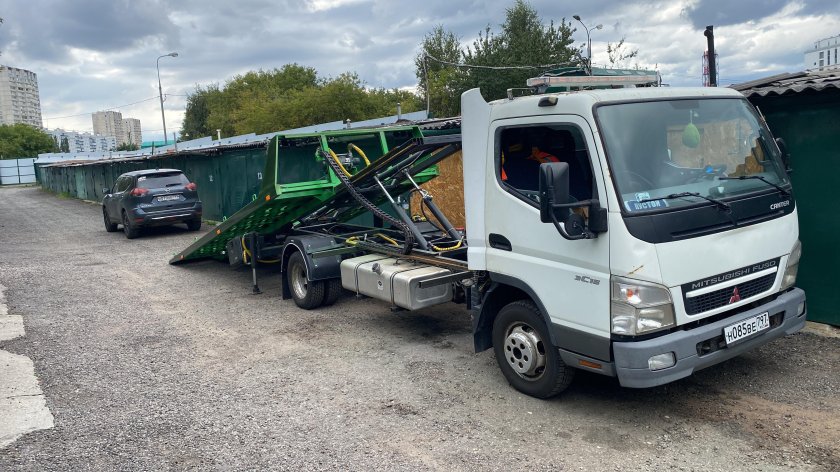 Эвакуатор исудзу со сдвижной платформой