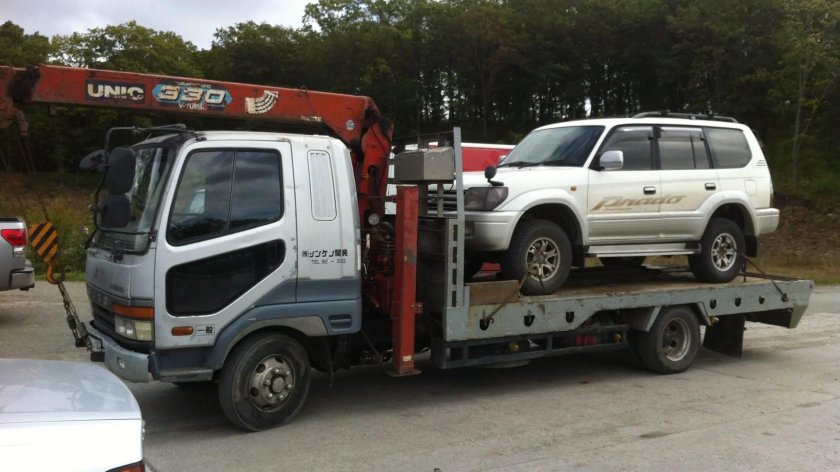 Мицубиси Фусо с краном