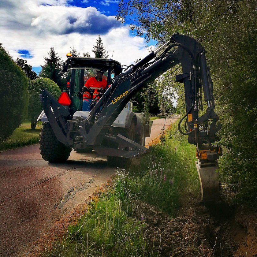 Lannen экскаватор погрузчик