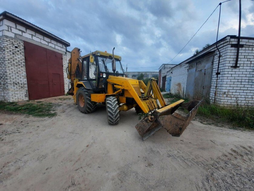 Экскаватор погрузчик атек 999е