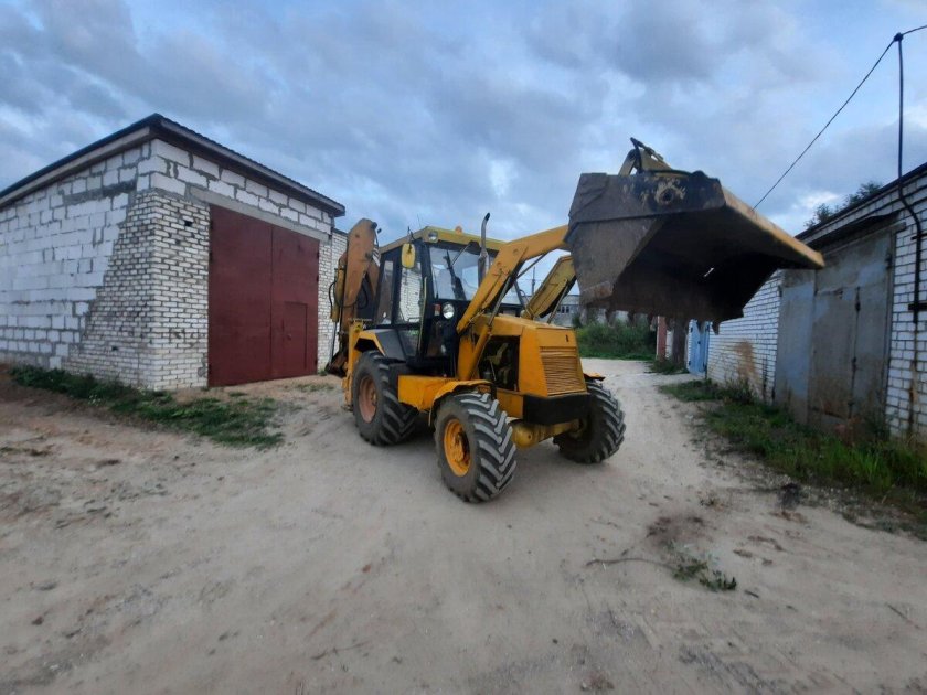 Экскаватор погрузчик АТЕК 999е