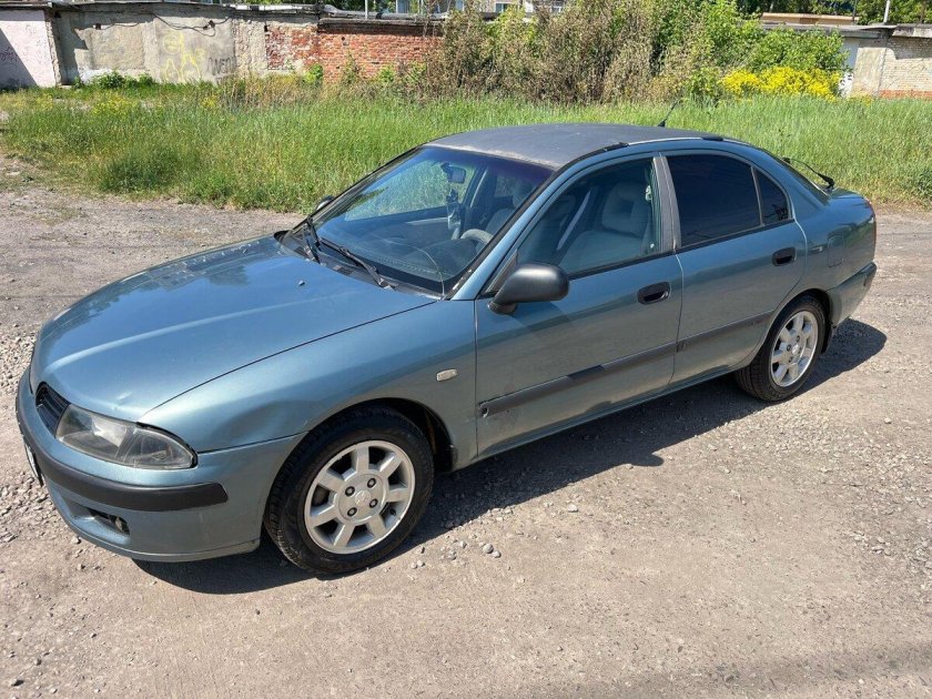 Мицубиси каризма 2001
