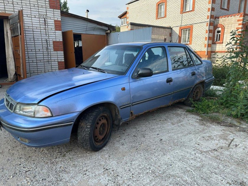 Голубая машина Деу некси седан