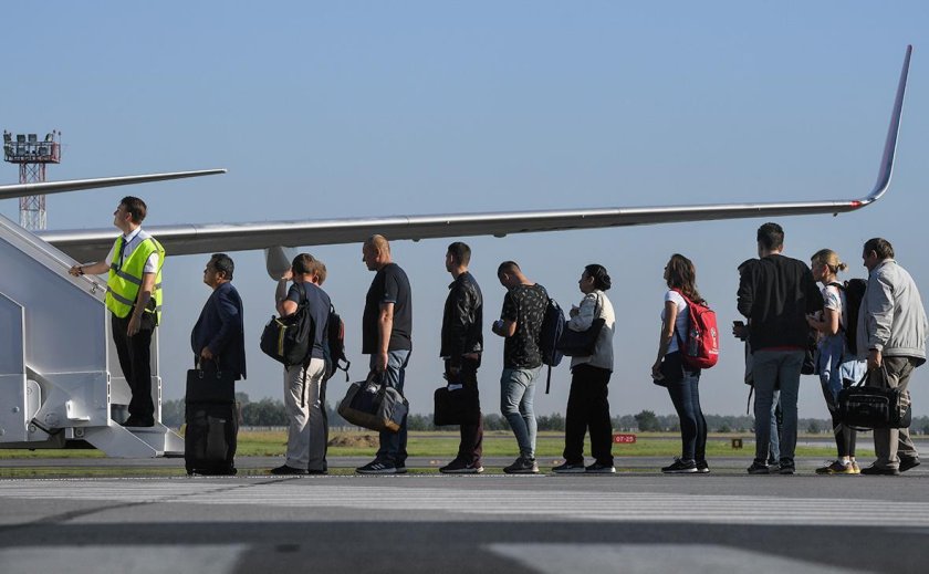 Посадка пассажиров в самолет