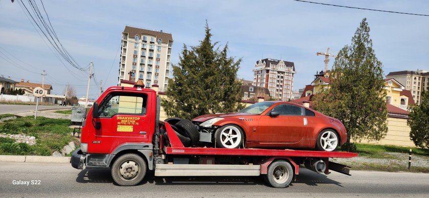 Машина эвакуатор