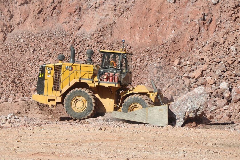 Колесный бульдозер Катерпиллер