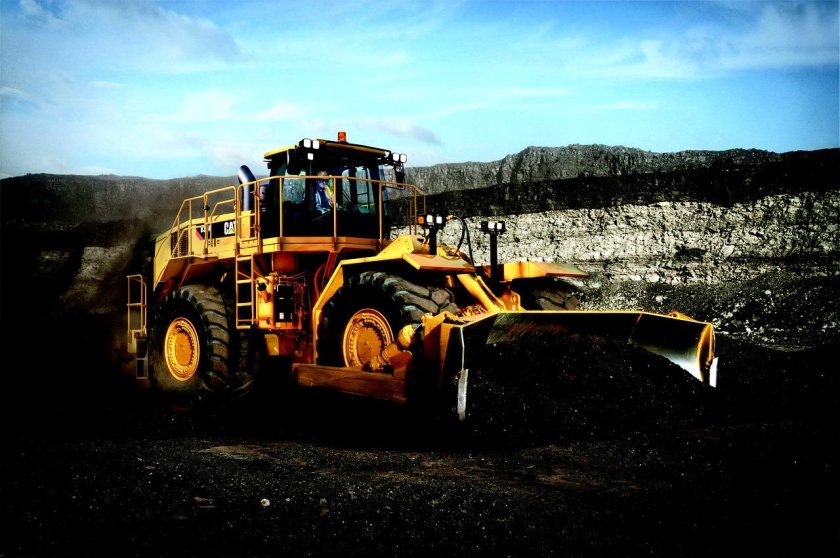 Колесный бульдозер Катерпиллер