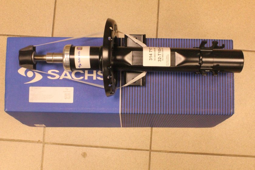 Передний амортизатор Skoda Rapid