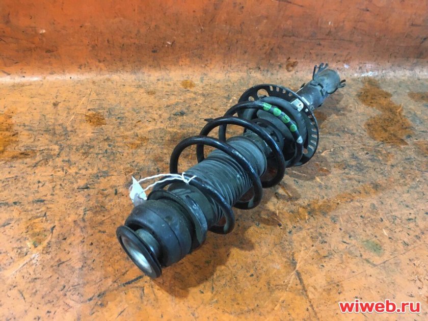 Стойка амортизатора Шкода Рапид