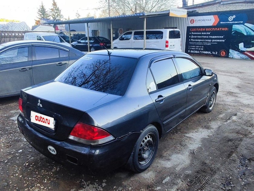 Мицубиси лансер 2003 года