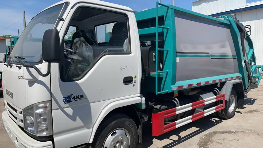 Исудзу грузовик мусоровоз