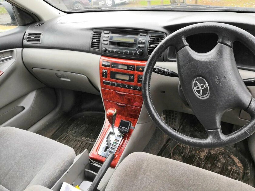 Салон Тойота Королла e120