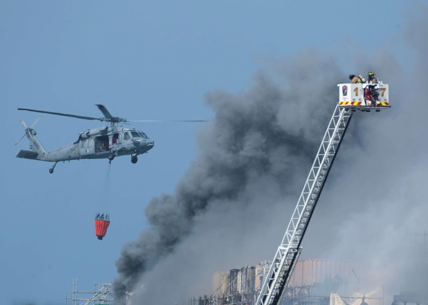 Крокус вертолет тушит пожар